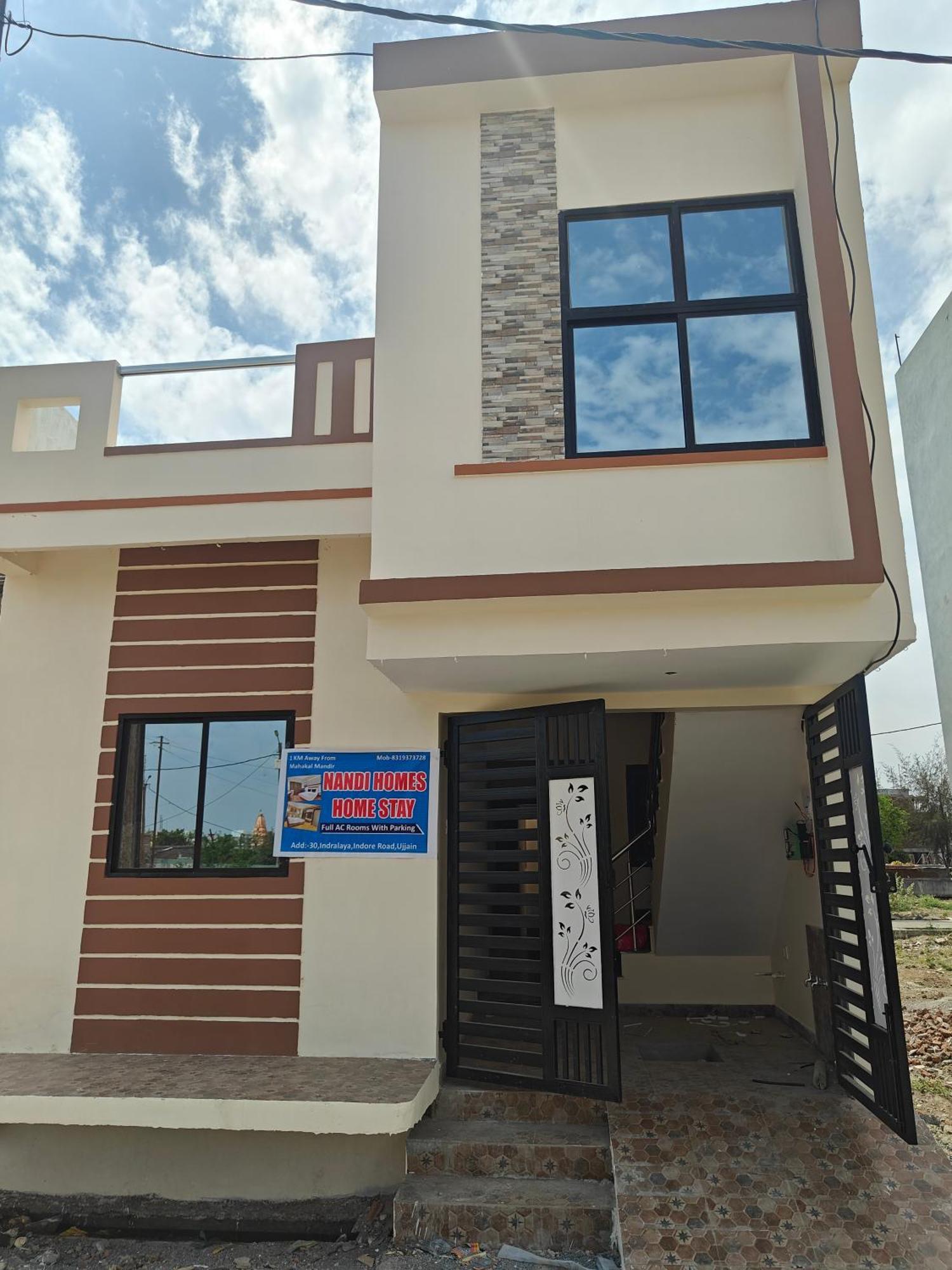 Nandi Homes Homestay اوجاين المظهر الخارجي الصورة